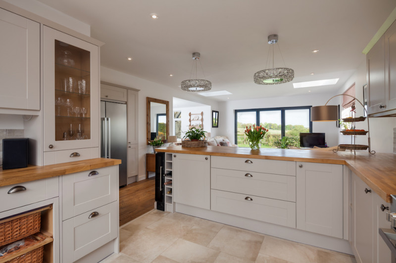ash kitchen cabinets with wooden worktop