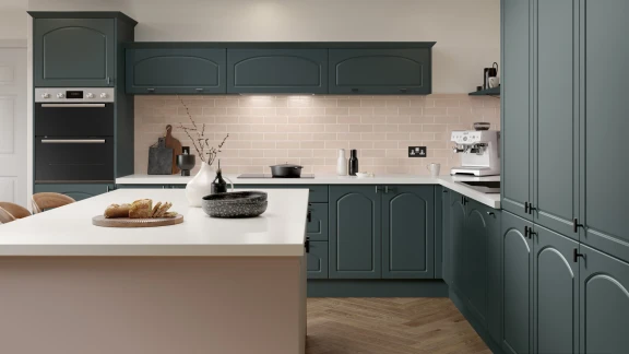 Barcelona curved arch doors in heritage green and dusky pink with pure white worktop