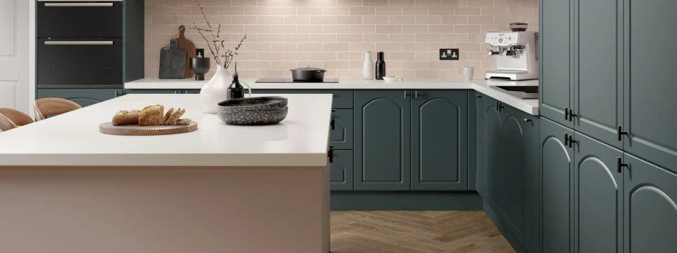 Barcelona curved arch doors in heritage green and dusky pink with pure white worktop