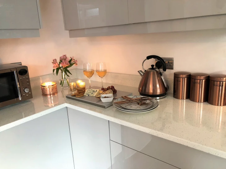white kitchen units and doors with white quartz worktop 5