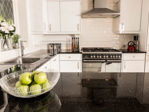 white gloss kitchen doors with black quartz worktop