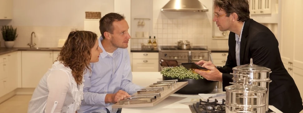kitchen consultant talking to customers