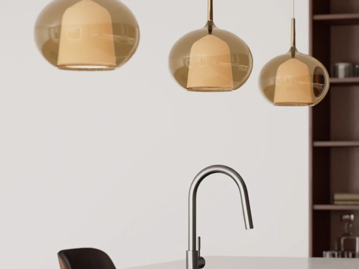 Kitchen sink and three pendant lights