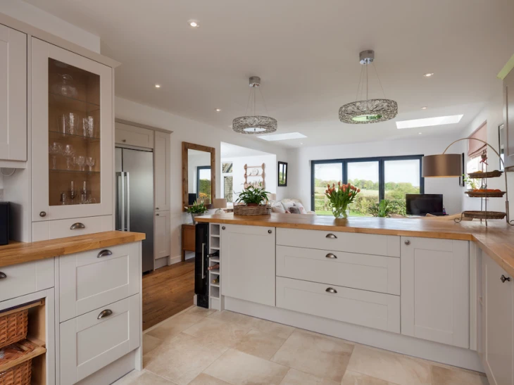 ash kitchen cabinets with wooden worktop