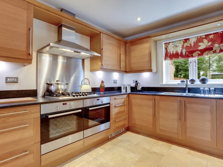 solid oak wood modern kitchen with double oven