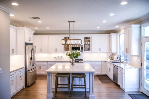 kitchen with white kitchen doors and island