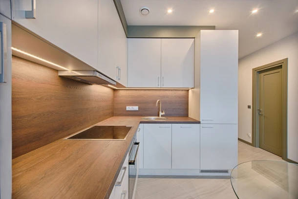 white matt effect kitchen doors with dark wood worktop