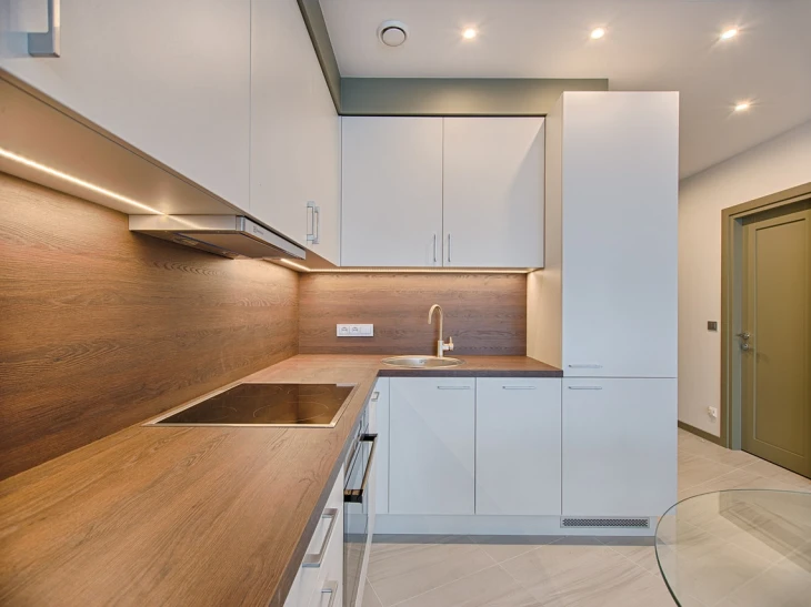 white matt effect kitchen doors with dark wood worktop