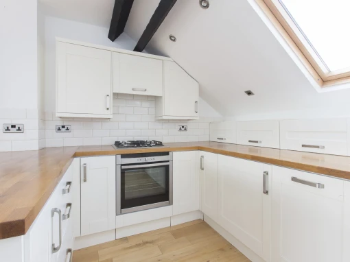 chatsworth range white kitchen doors with wooden worktop skylight