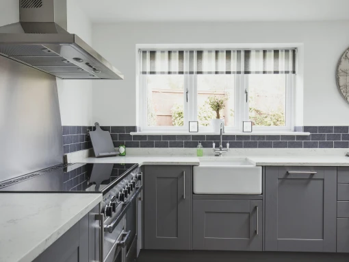 chelsea range kitchen with grey doors and white marble worktop