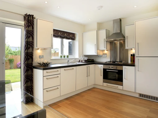 classic cream kitchen doors with dark wooden worktop
