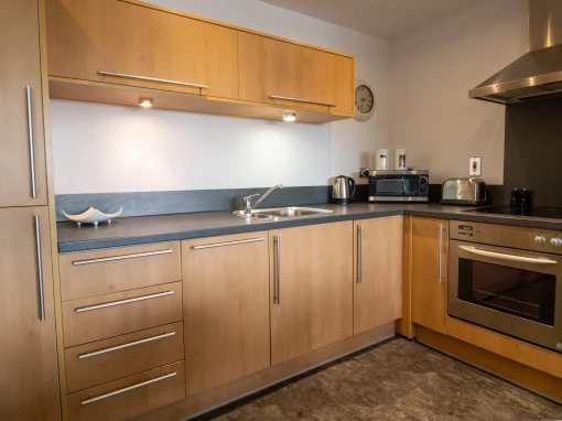 classic style kitchen with light brown wood effect kitchen doors