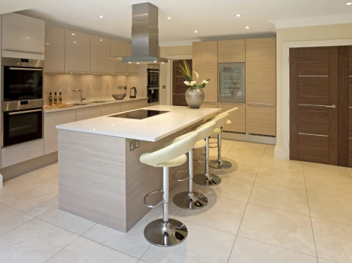 kensington style kitchen with light grey units and kitchen island